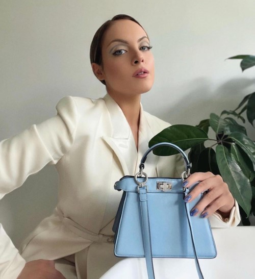 Elizabeth Gillies in white overcoat suit 2  nude photo