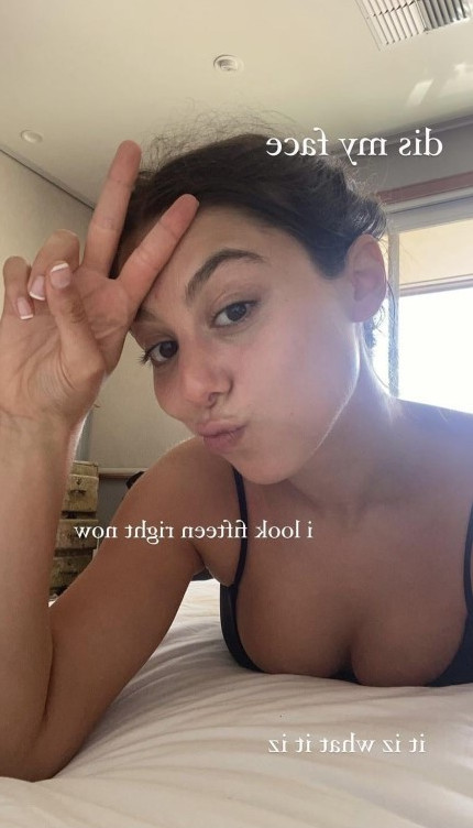 Kira Kosarin Bed Cleavage 1  nude photo