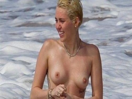 Miley Cyrus Topless On Beach  nude photo