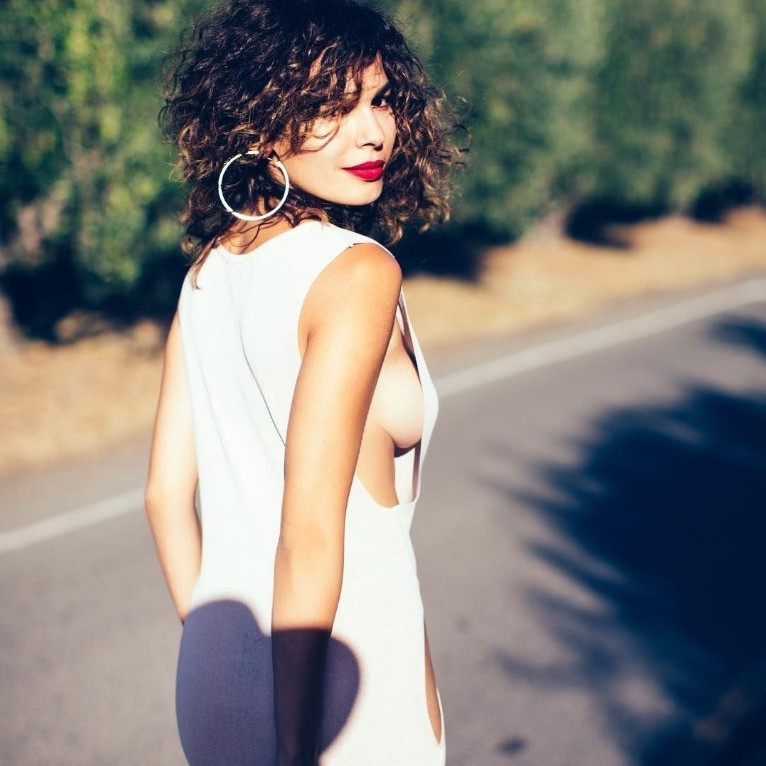 Nadine Velazquez Boob Slip Side View  nude photo