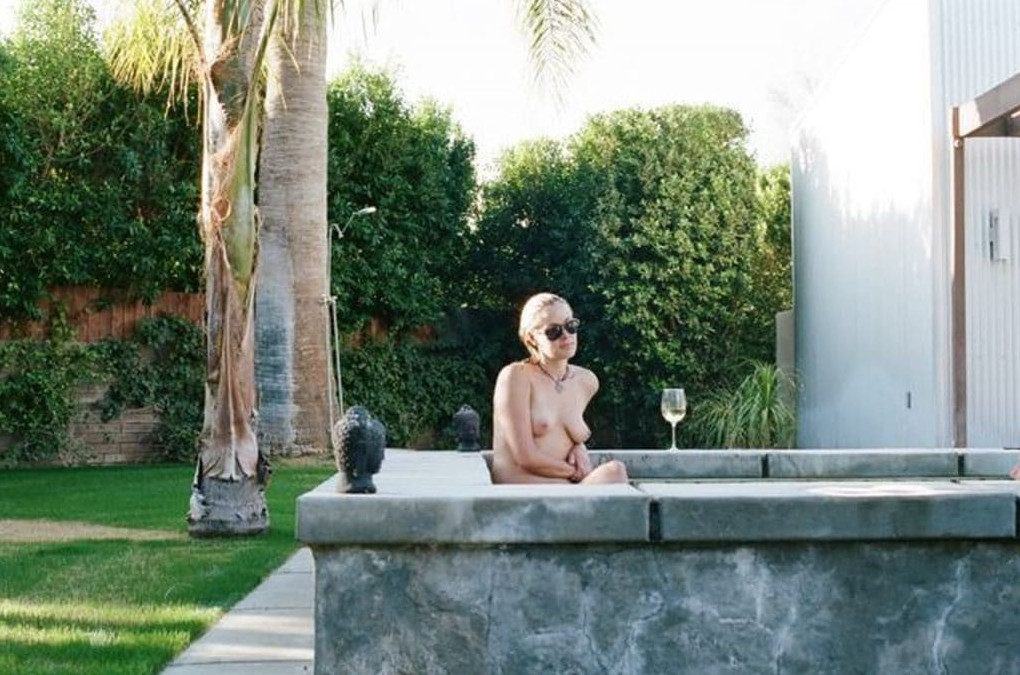 Kristanna Loken Sitting In A Hot Tub Topless  nude photo